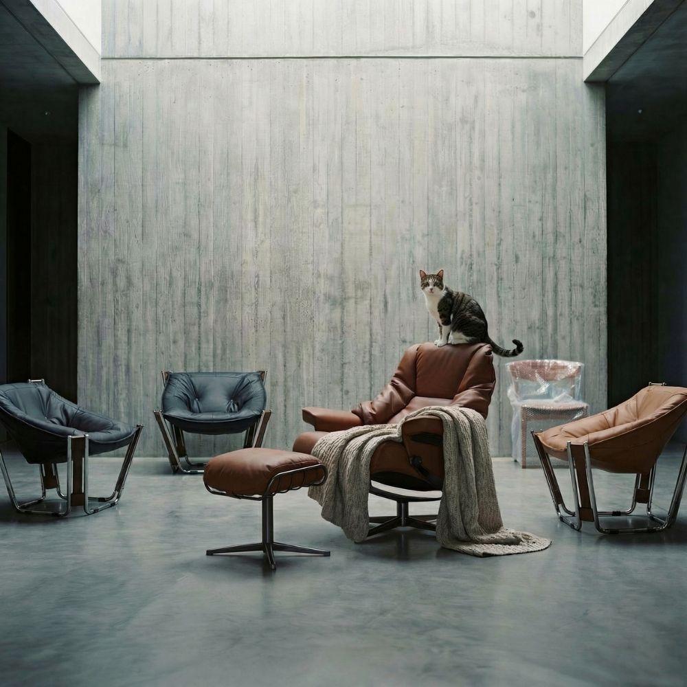 Black Cocoon Lounge Chair by BEACON, modern armchair with rounded, cocoon-shaped design for comfortable seating.