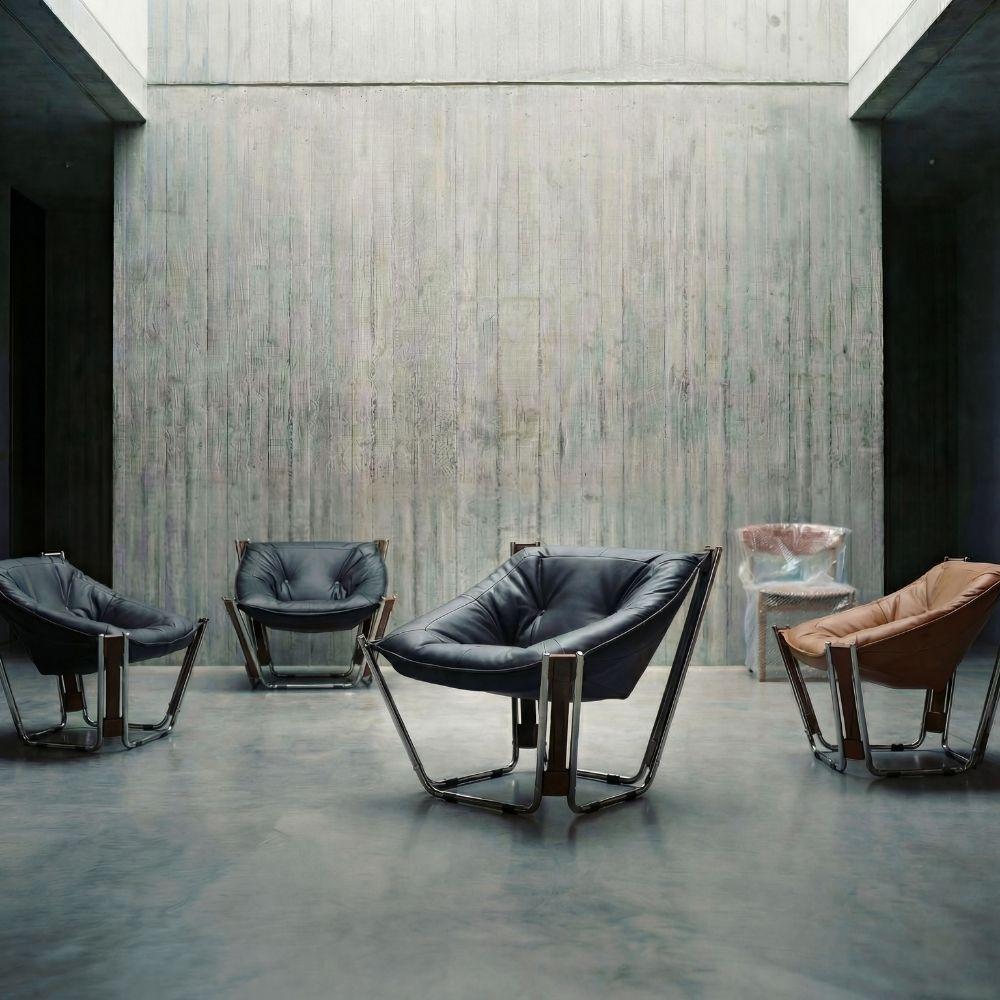 Black Cocoon Lounge Chair by BEACON with a cozy, rounded design and plush cushioning for comfortable seating.