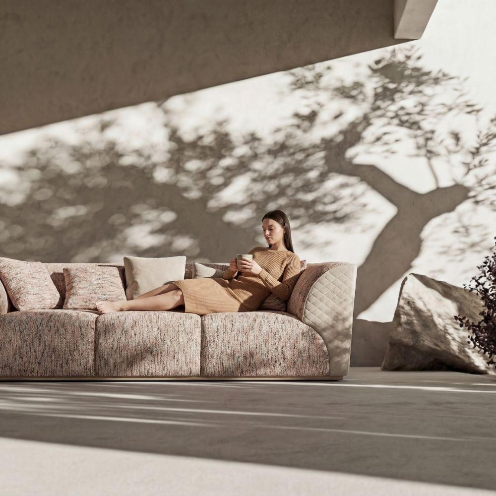 beige sofa in a minimal living room with sunlight