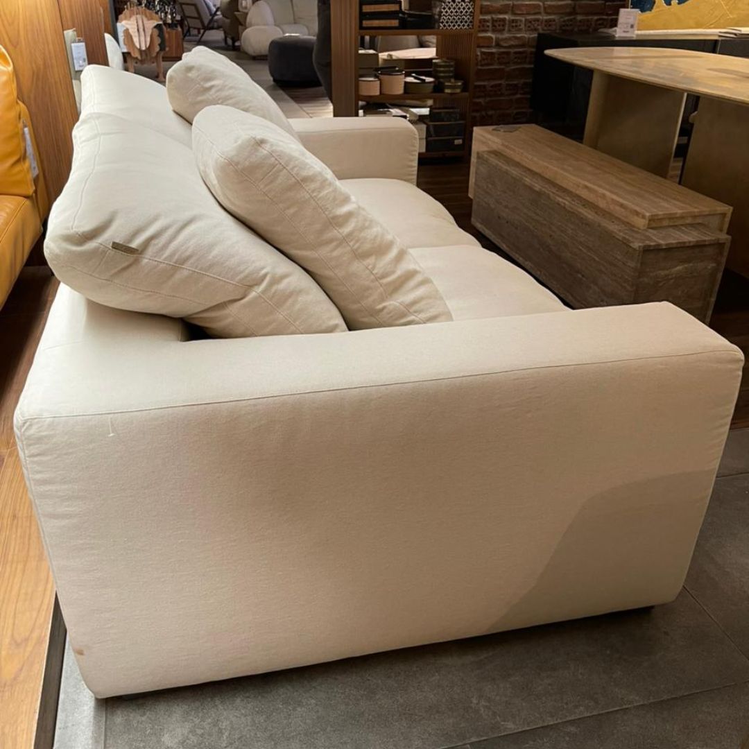 Display of BEACON CHAM 2-Seater sofa showing the fabric and design in a showroom setting.