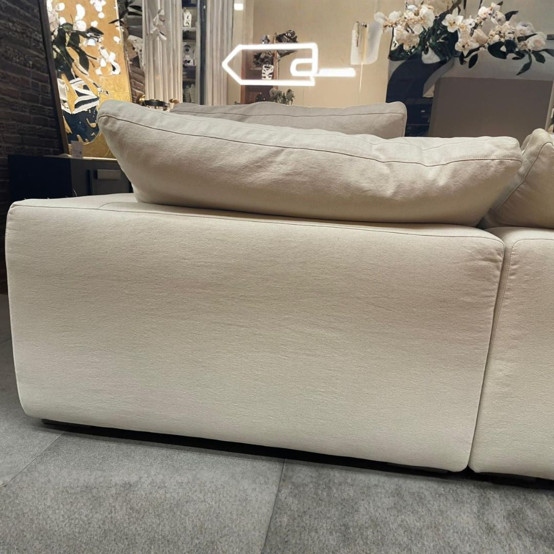 Display of BEACON CHAM 2-Seater sofa showing plush fabric and modern design with two seat cushions and stylish armrests.