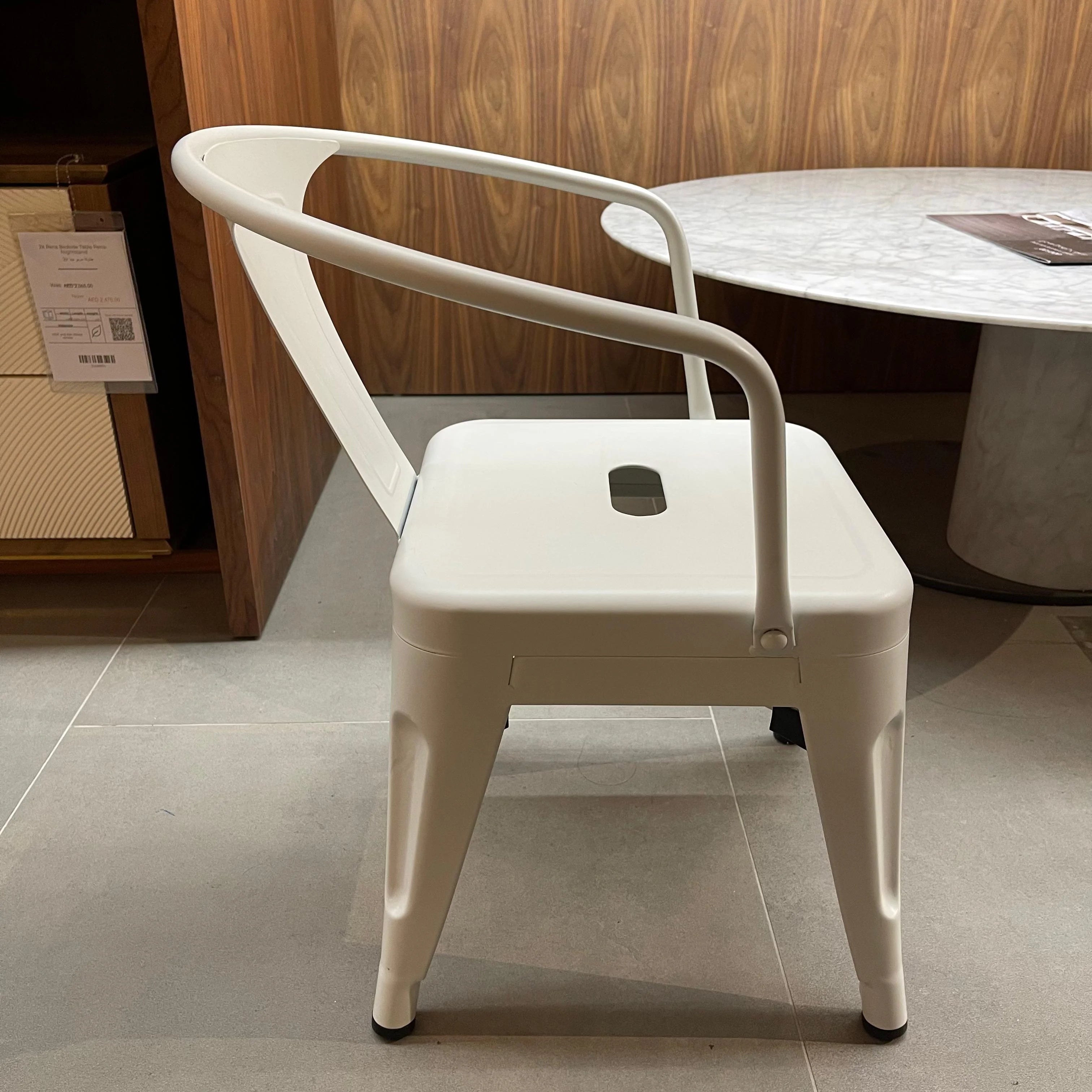 Metal kids chair in black with a sturdy frame, displayed as a RUDI brand model K01-W for children.