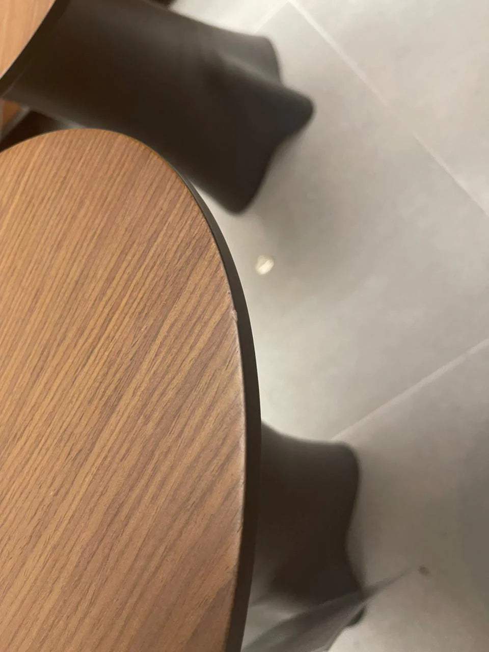 Set of 2 Guzzi side tables by TOGO Home Style, showcasing sleek design and modern style in a display setting.