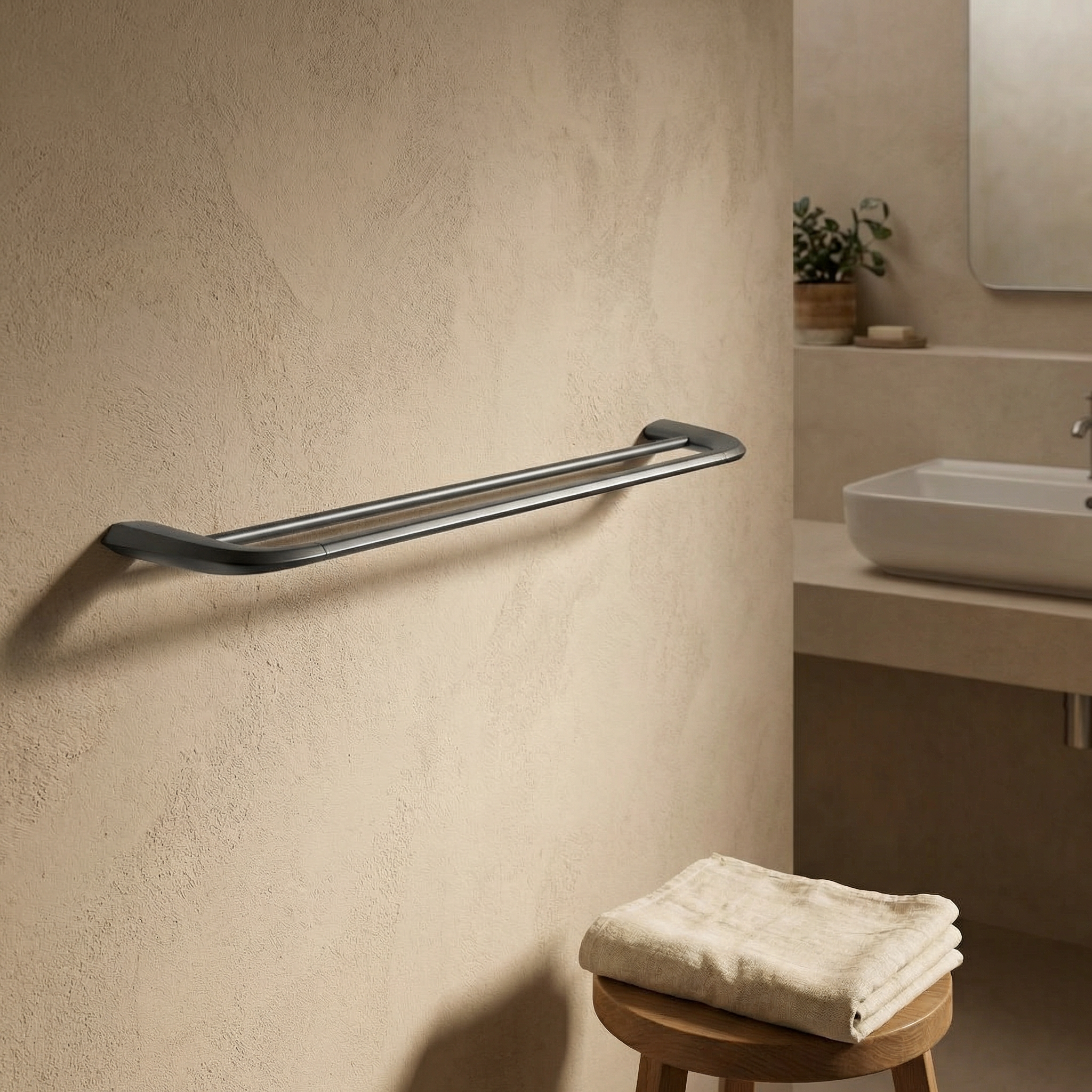 Double Velo towel bar in gunmetal finish with two hooks for bathroom organization, from BEACON.