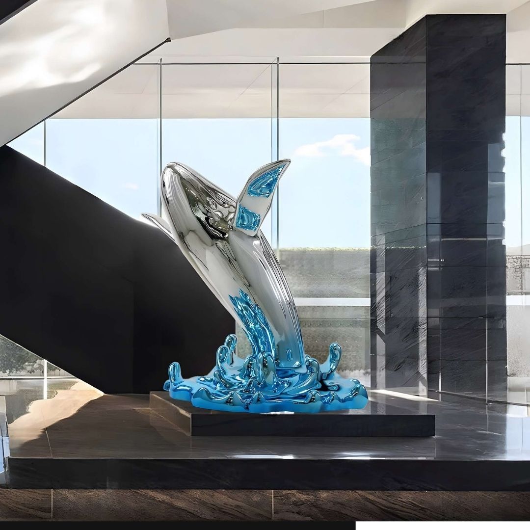 Long fiberglass whale sculpture by BEACON, showcasing a sleek, artistic marine-themed artwork with smooth, glossy finish.