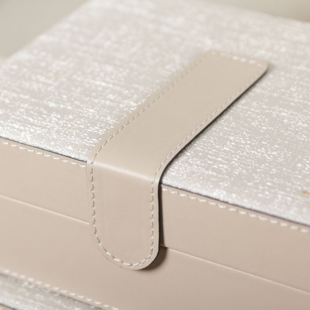 Hinged leather jewellery box by BEACON featuring a decorative design with a smooth leather finish and secure hinged lid.