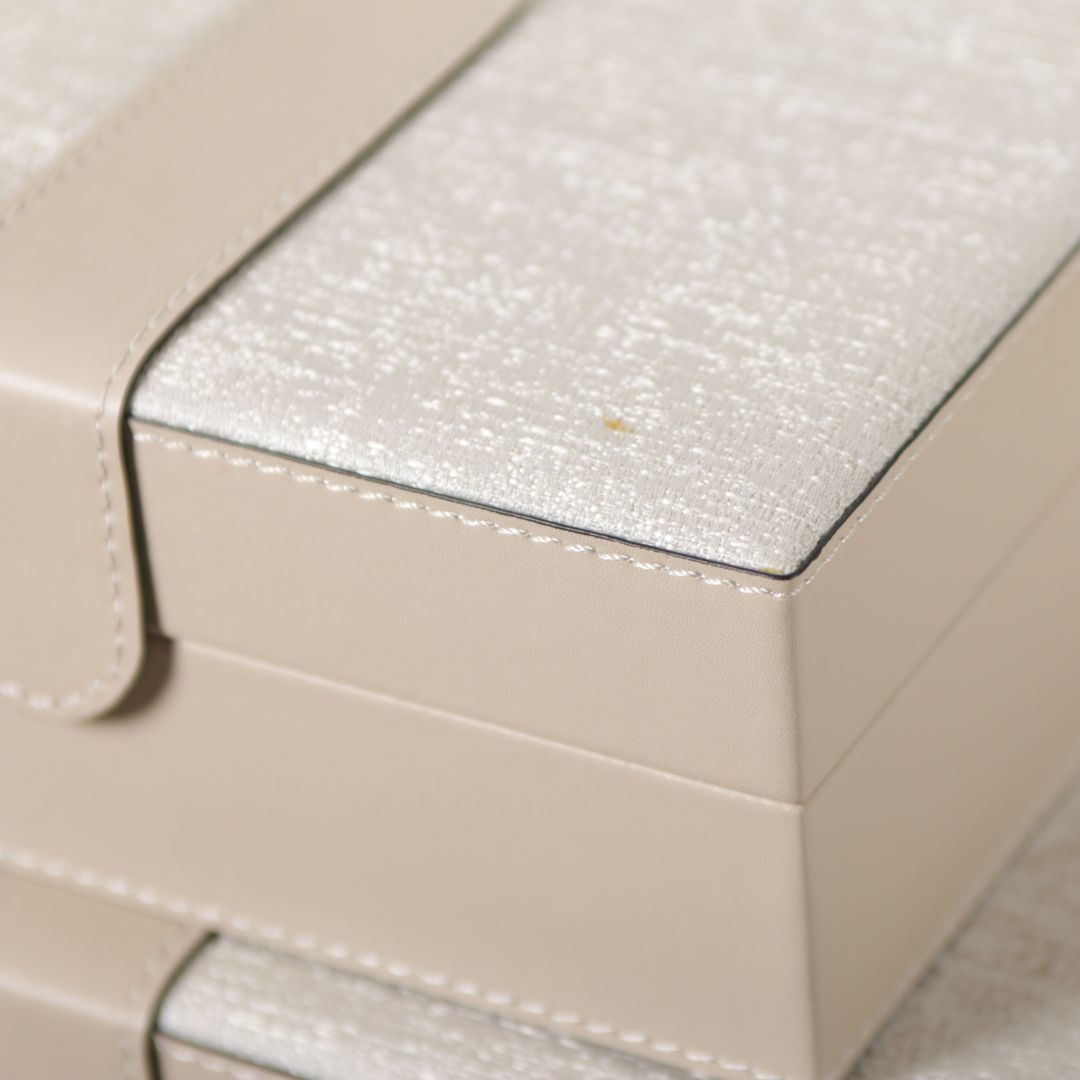 Hinged leather jewellery box by BEACON, decorative storage box with a textured leather exterior and hinged lid.