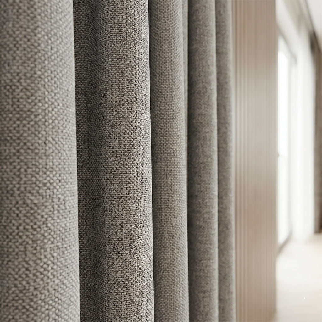 Beige polyester curtain fabric from BEACON Hush collection, featuring soft drape and smooth texture for elegant window treatment.
