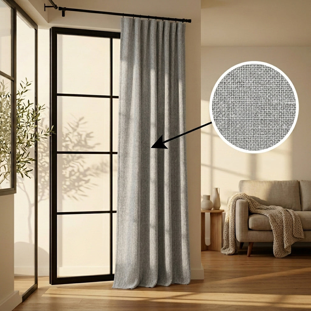 Light gray Hush polyester curtain fabric by BEACON, shown draped for curtains and drapes, with a soft and smooth texture.