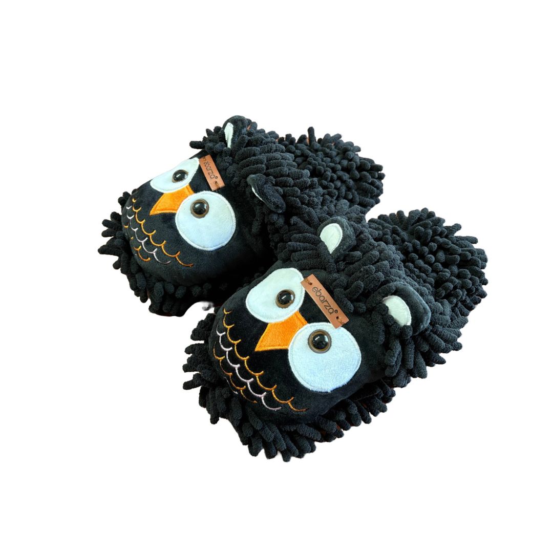 Children's black animal slippers by BEACON featuring soft plush material and fun animal designs for cozy indoor wear.