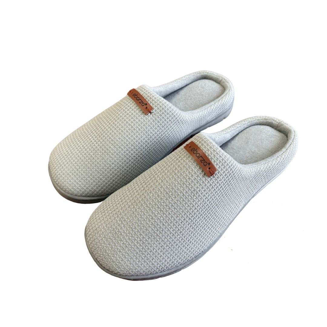 Light grey men's slippers by BEACON, featuring comfortable slip-on design and soft fabric for casual wear.
