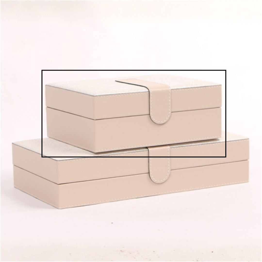 Decorative hinged leather jewelry box by BEACON with a sleek design and secure clasp, perfect for organizing jewelry items.