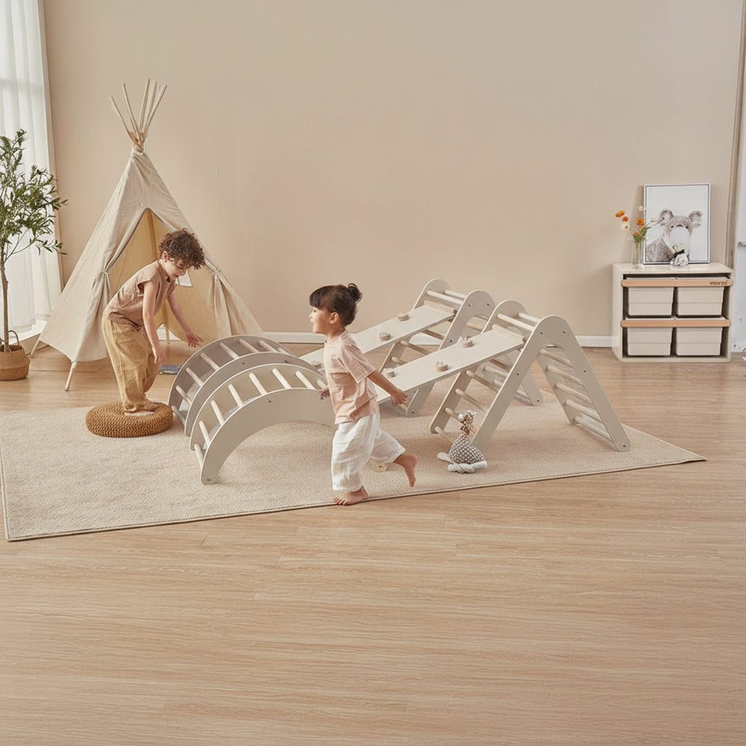 Kids climbing arc, board, and triangle set by BOORI, featuring colorful wooden climbing shapes for children’s play and activity.