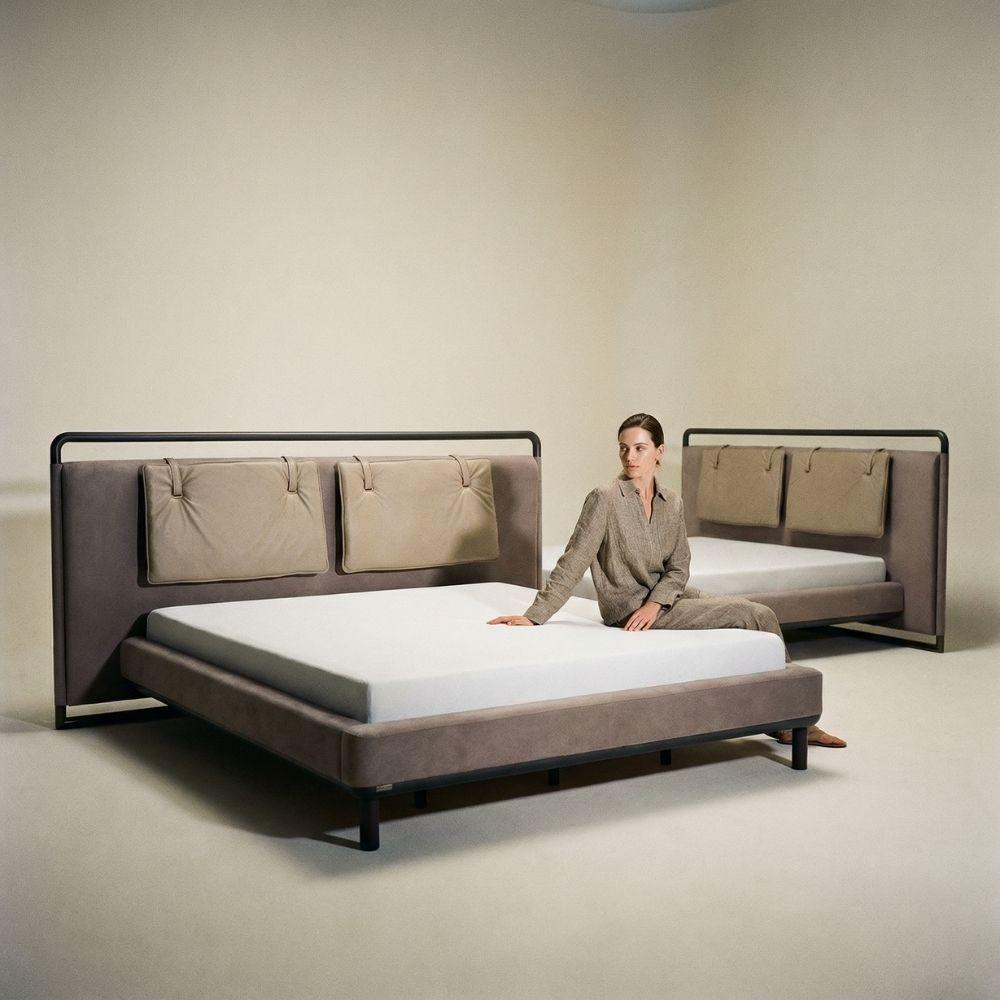 ECOLE LIVING LİYA bedstead with a modern wooden frame, shown in a stylish bedroom setting.