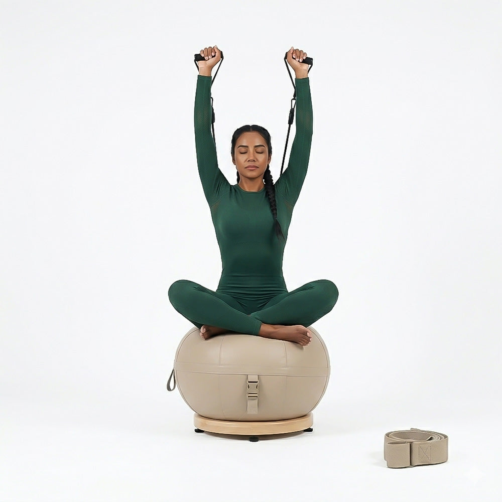 Leather yoga ball with beech wood base from BEACON, designed for fitness and stability exercises in gym settings.