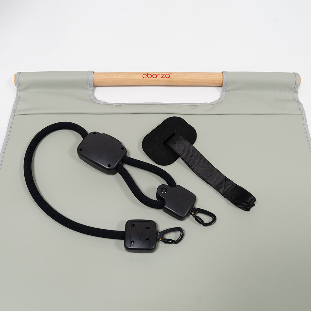 Leather yoga mat with beech wood handle by BEACON, designed for comfortable yoga practice and easy carrying.