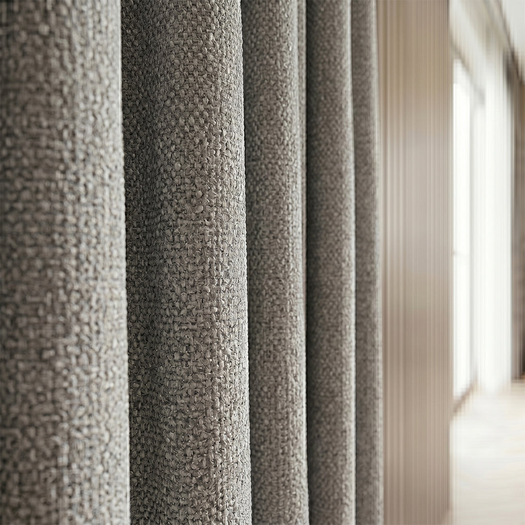 Beige mono polyester curtain fabric by BEACON, featuring a smooth, durable drape suitable for curtains and window treatments.