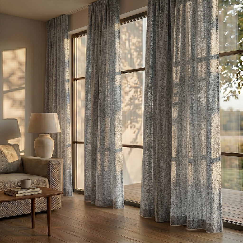 Beige mono polyester curtain fabric from BEACON, showing soft drape and smooth texture for curtains and drapes.