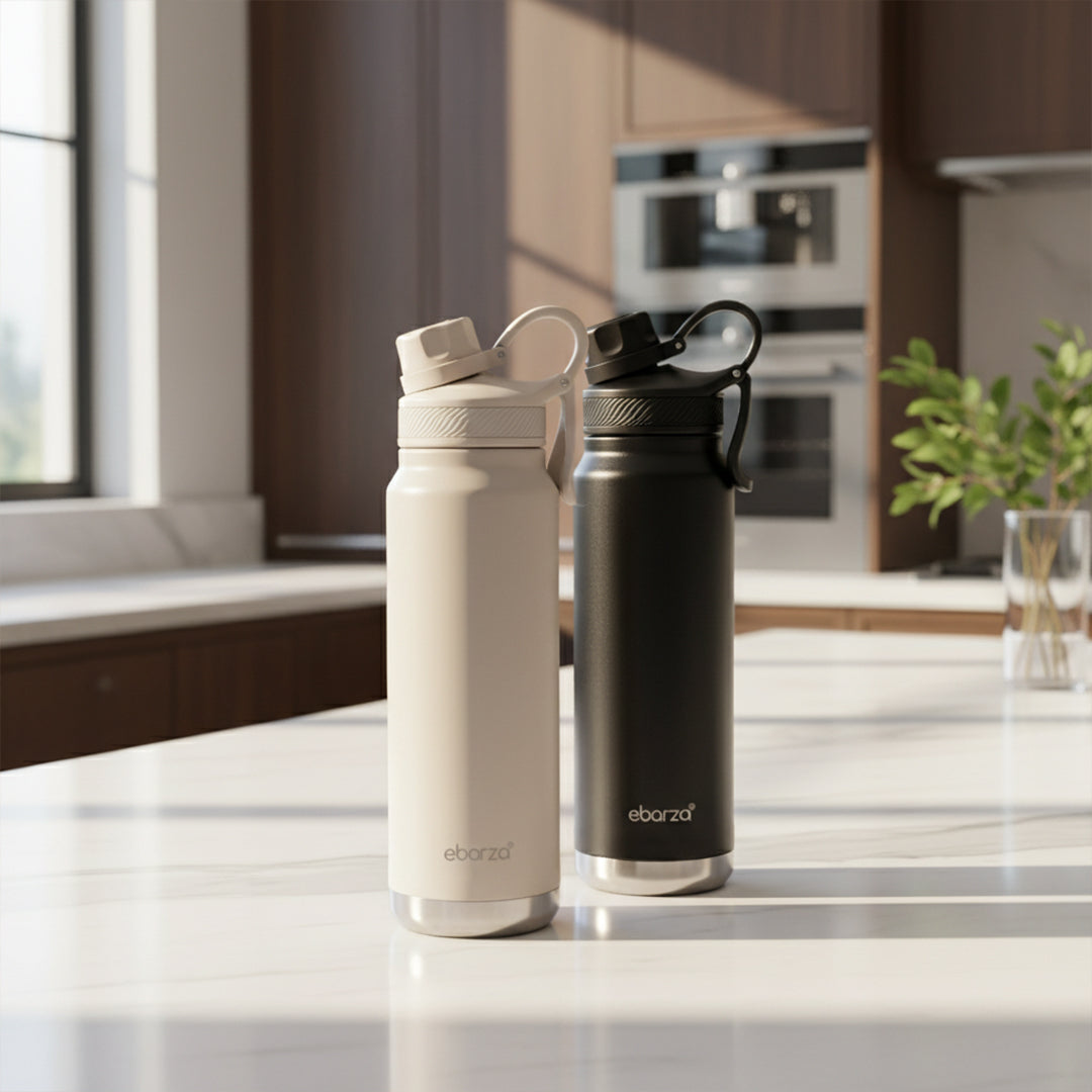 Black 709ml BEACON drinkware bottle with a sleek design, ideal for beverages and daily use.