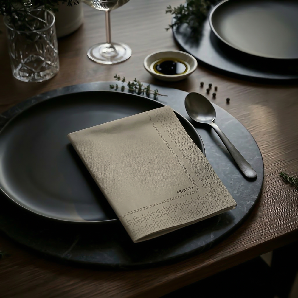 Pack of DNFDG EBARZA-Warm Grey 2C paper napkins with a stylish warm grey print, ideal for casual or formal table settings.