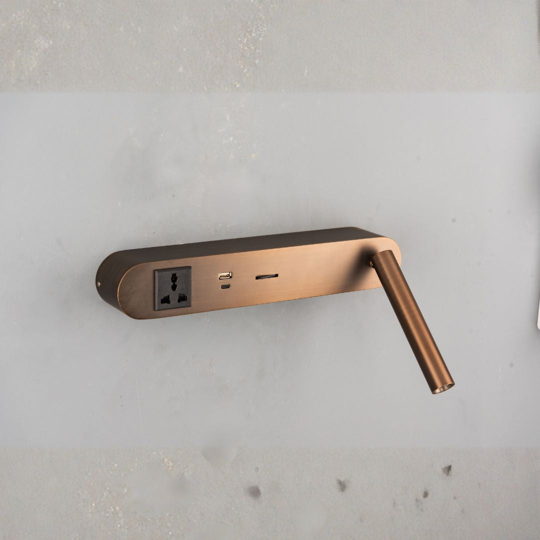 Wall-mounted hotel style headboard reading lamp by BEACON, featuring sleek design and adjustable light for bedside reading.