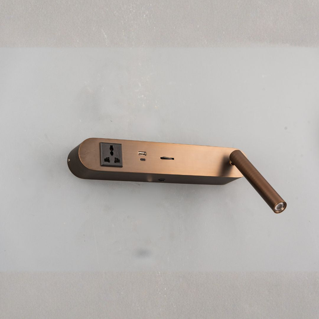 BEACON wall reading lamp mounted on a hotel-style headboard, featuring sleek design and adjustable lighting for bedside reading.