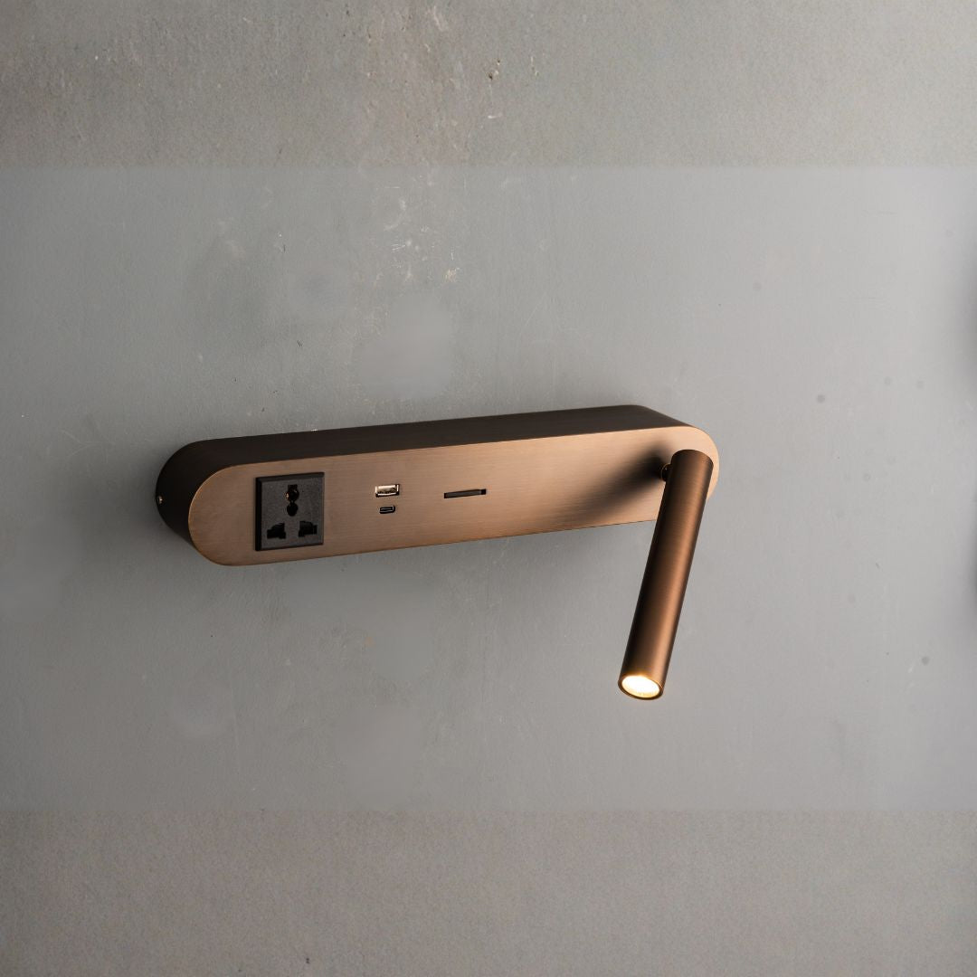 BEACON wall reading lamp mounted on a hotel style headboard, with a sleek design for bedside reading illumination.
