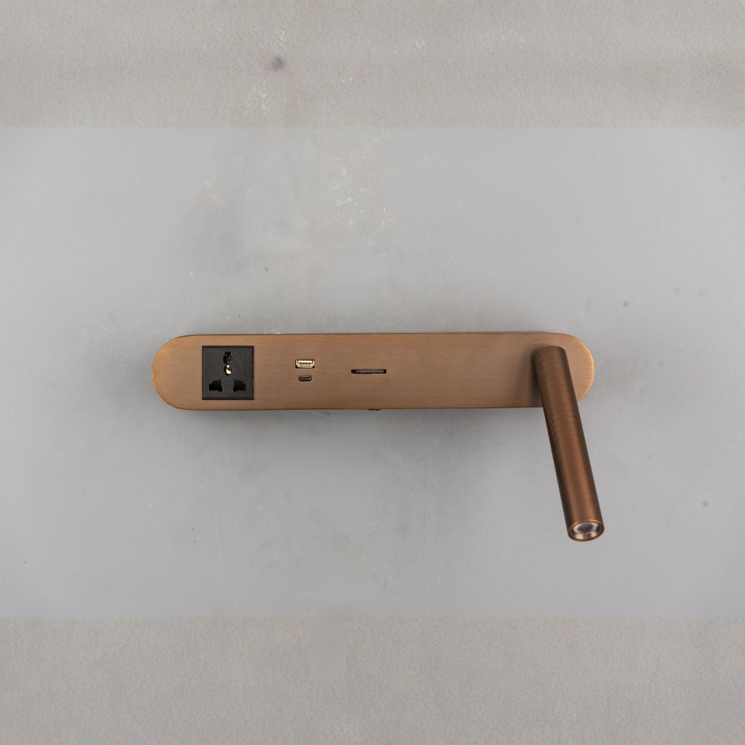 BEACON wall reading lamp mounted above a hotel-style headboard, with a sleek, modern design and adjustable arm for bedside reading.
