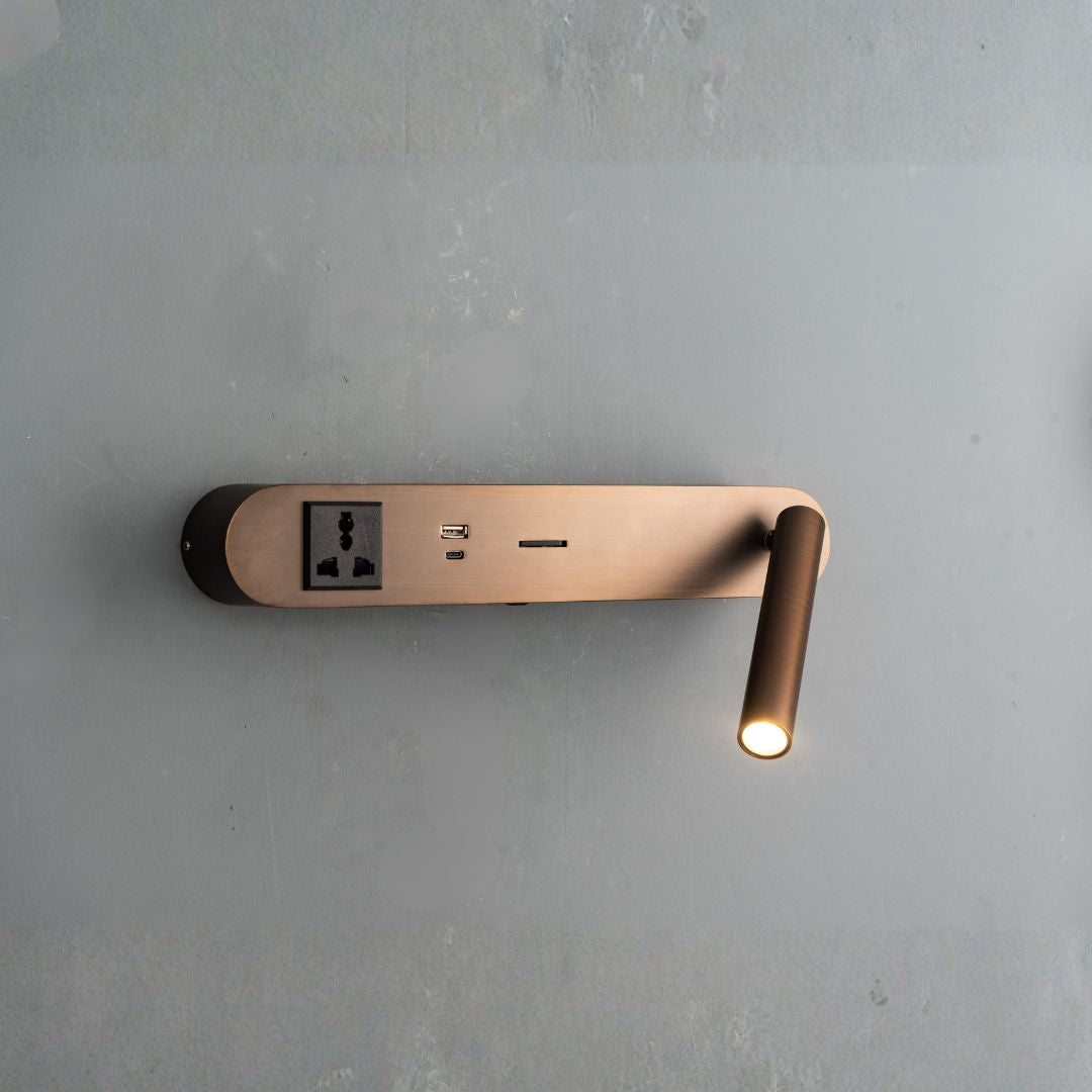Wall-mounted reading lamp with hotel-style headboard design from BEACON, featuring a sleek, modern look for cozy bedside lighting.
