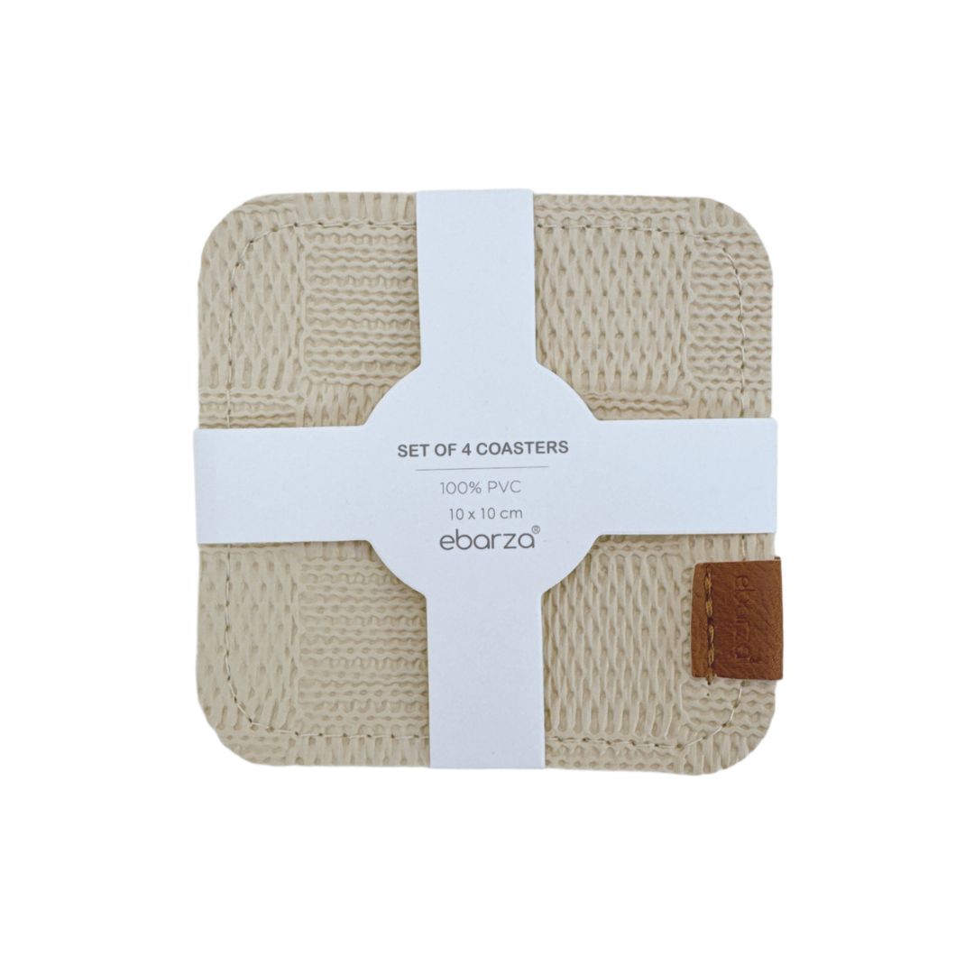 Set of four beige BEACON coasters with a smooth surface, designed to protect surfaces from drink spills.