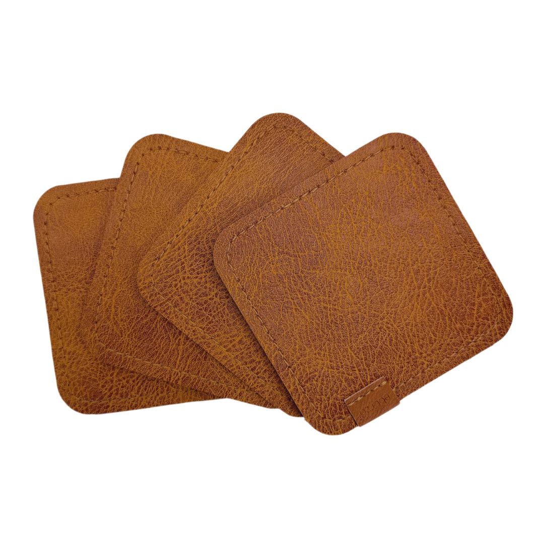 Set of 4 brown coasters with textured surface, designed for protecting tabletops, by BEACON.