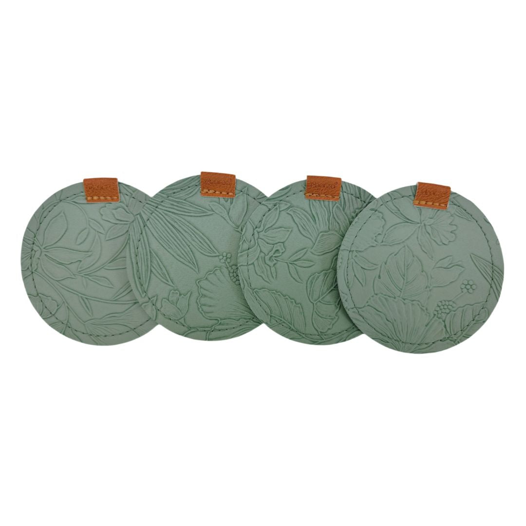 Set of four green coasters by BEACON, featuring a stylish design, perfect for protecting surfaces from drinks.