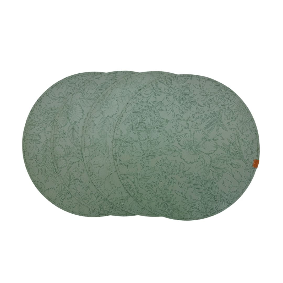 Set of four green placemats with basket packing from BEACON, suitable for table setting and decorative dining use.