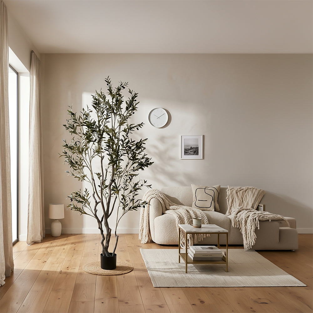 Artificial olive tree, 210cm tall, with realistic green leaves and multiple branches, ideal for home or office decor.