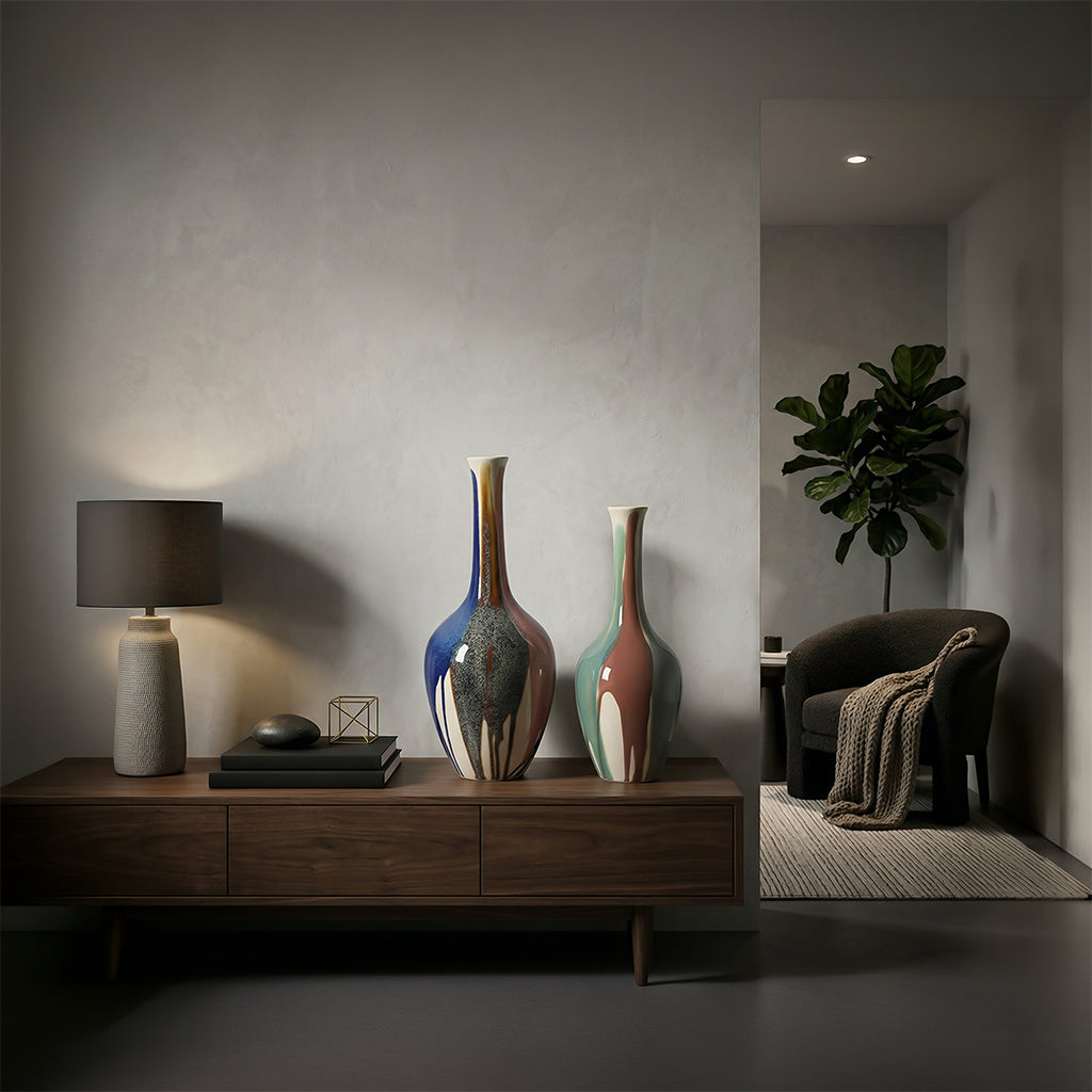 Slender ceramic vase with splashed glaze finish, designed by BEACON, ideal for decorative floral arrangements or display.