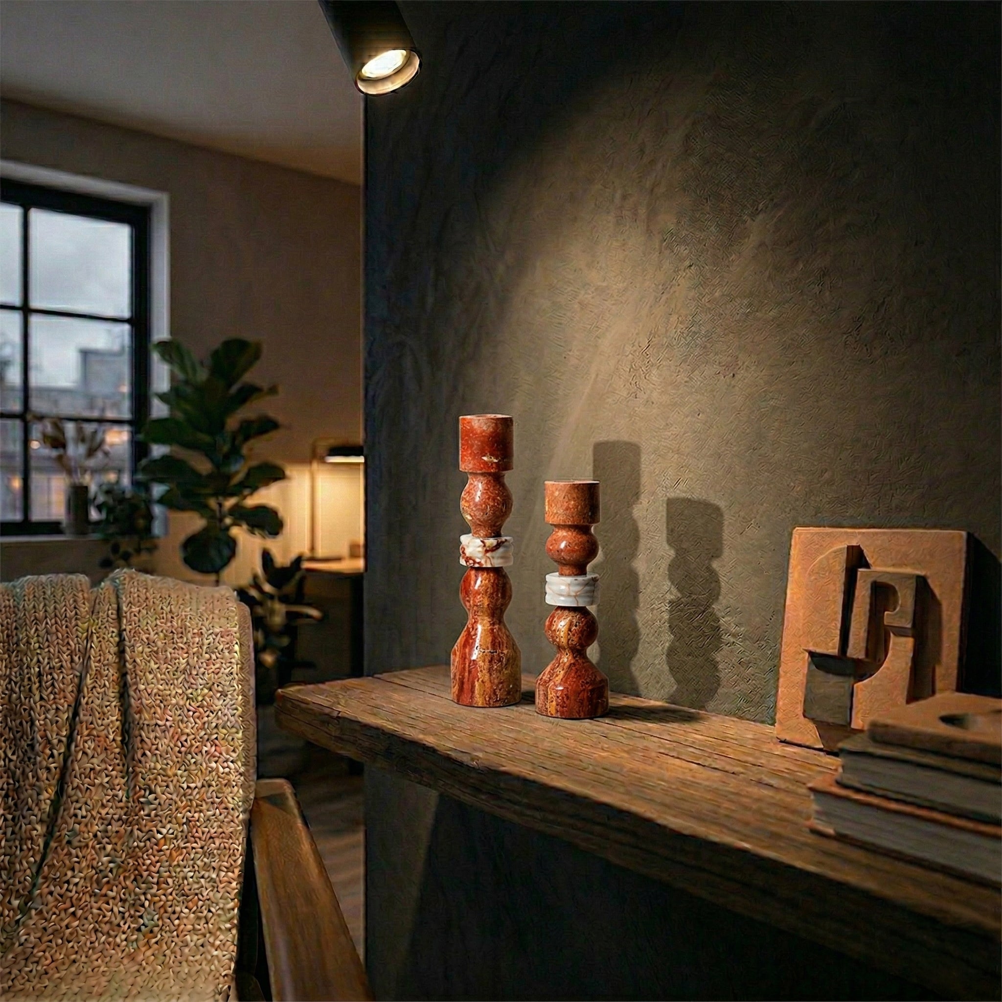 Red marble stone string candlestick holder from BEACON, featuring a sleek, modern design for decorative candle display.