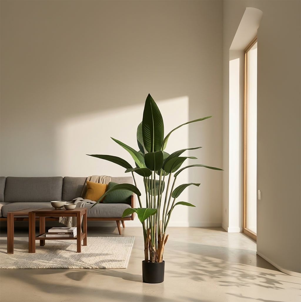 Artificial Strelitzia Reginae tree by BEACON, 100cm tall, featuring vibrant green leaves and colorful bird-of-paradise flowers.