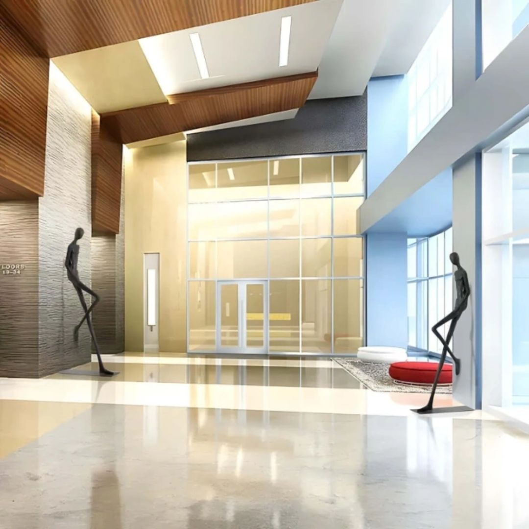 Fiberglass sculpture titled "Stride of Confidence" by BEACON, showcasing a dynamic figure with smooth, artistic design.