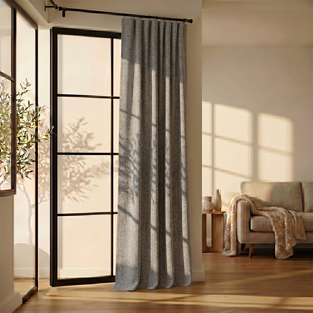 Beige Tallow polyester curtain fabric from BEACON, featuring a smooth textured drape, ideal for curtains and home décor.