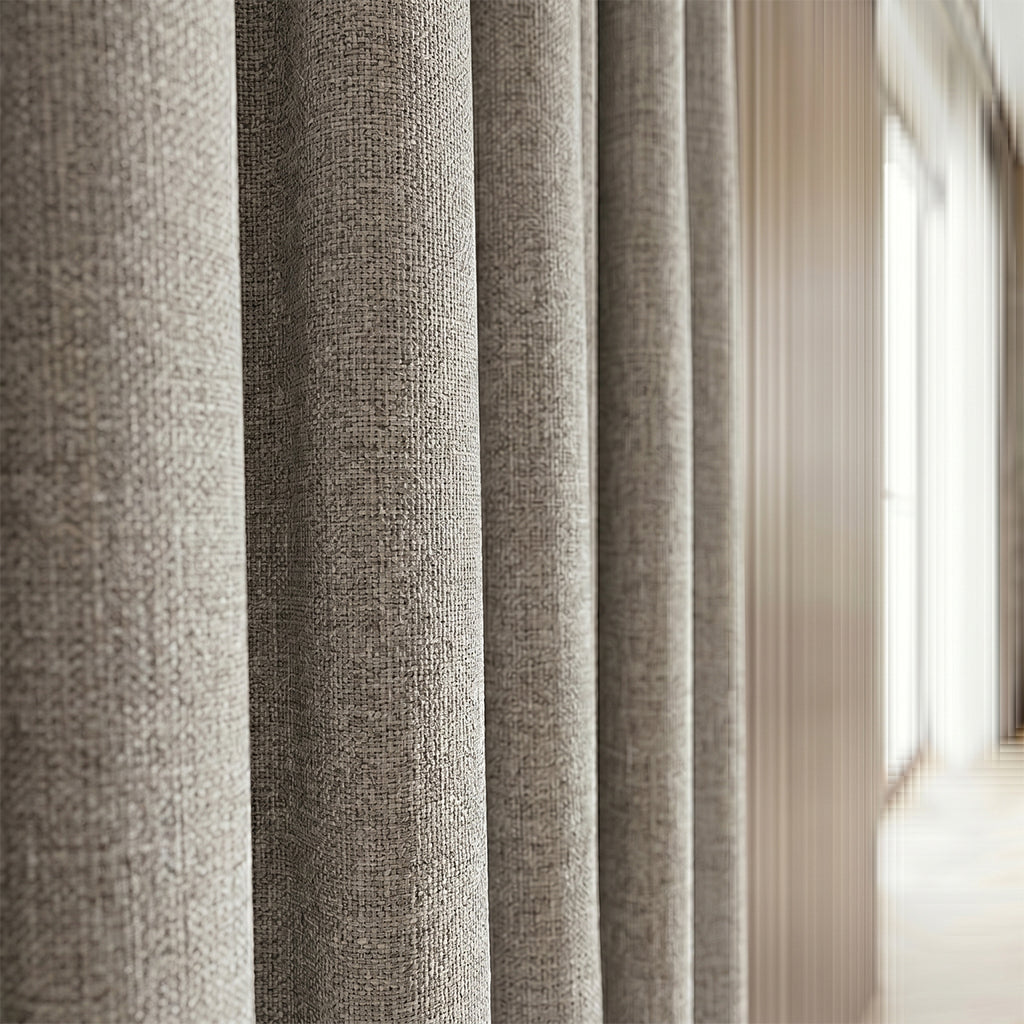 Beige Tallow polyester curtain fabric from BEACON, designed for curtains and drapes, showing a close-up of the textured material.