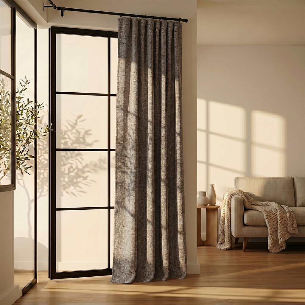 Beige Tallow polyester curtain fabric from BEACON, shown as drapery textile with a smooth, woven texture.