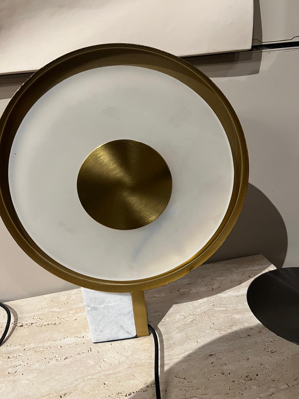 Aaalborg marble table lamp display item by Beacon with a sleek marble base and modern design, shown on a neutral background.