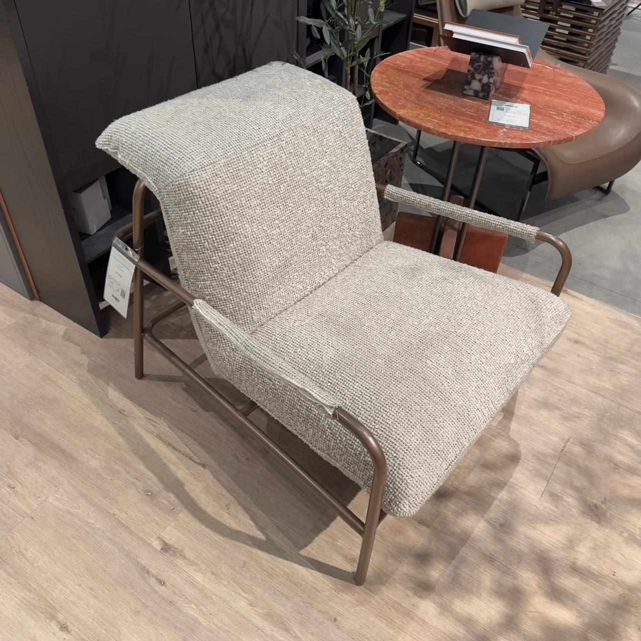 Gamma Armchair by Homage Koltuk, showcasing a modern, plush armchair with sleek design and neutral upholstery.