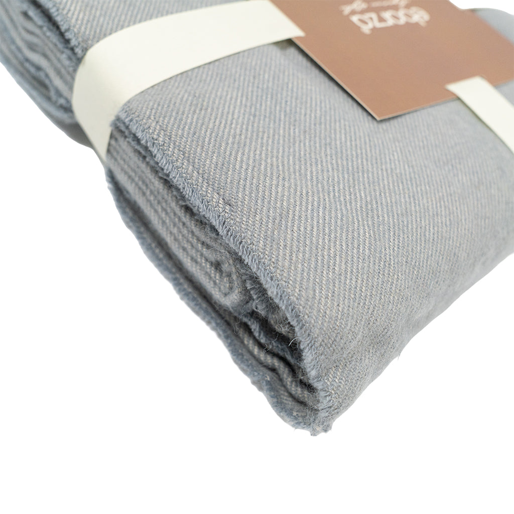 BEACON Fjord Wool Throw Blanket DR-THW15 displayed folded, showcasing soft, cozy wool fabric in neutral tones.