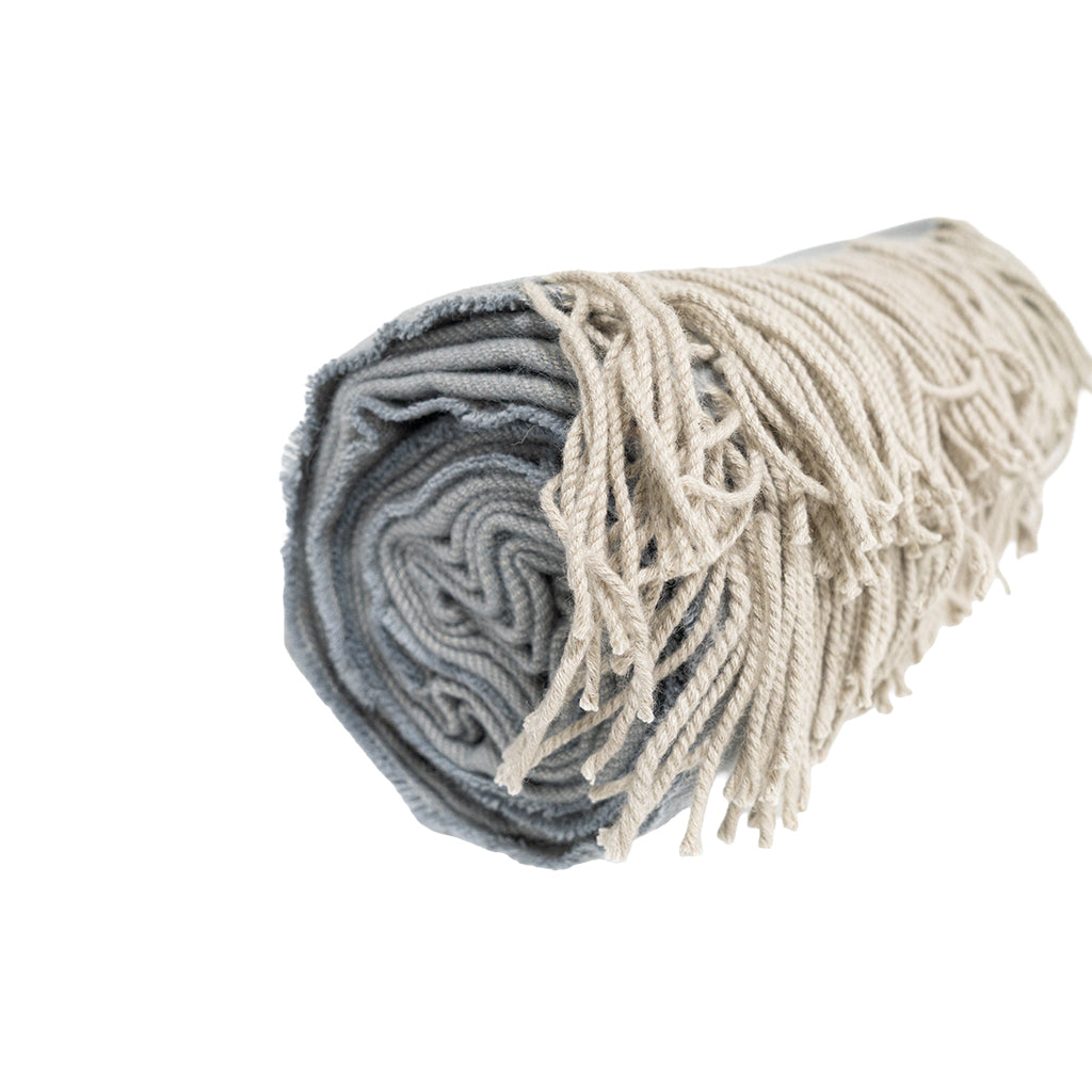 BEACON Fjord Wool Throw Blanket DR-THW15 in cozy, textured wool with fringed edges, perfect for adding warmth and style.