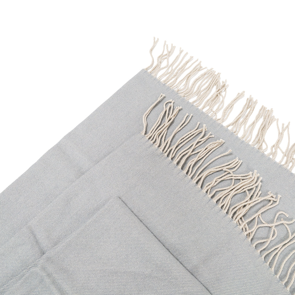 BEACON Fjord Wool Throw Blanket in neutral tones, soft and cozy wool blanket for added warmth and comfort.