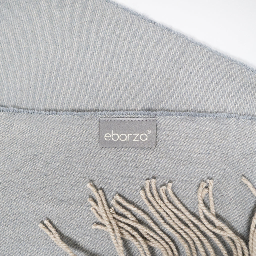 BEACON Fjord Wool Throw Blanket DR-THW15 in cozy, textured wool with fringed edges, perfect for adding warmth to any space.