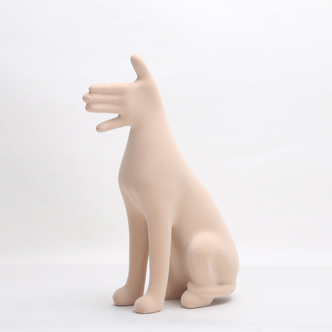 Abstract friendly dog sculpture from BEACON home decor figurines, featuring a modern, artistic dog design in neutral tones.