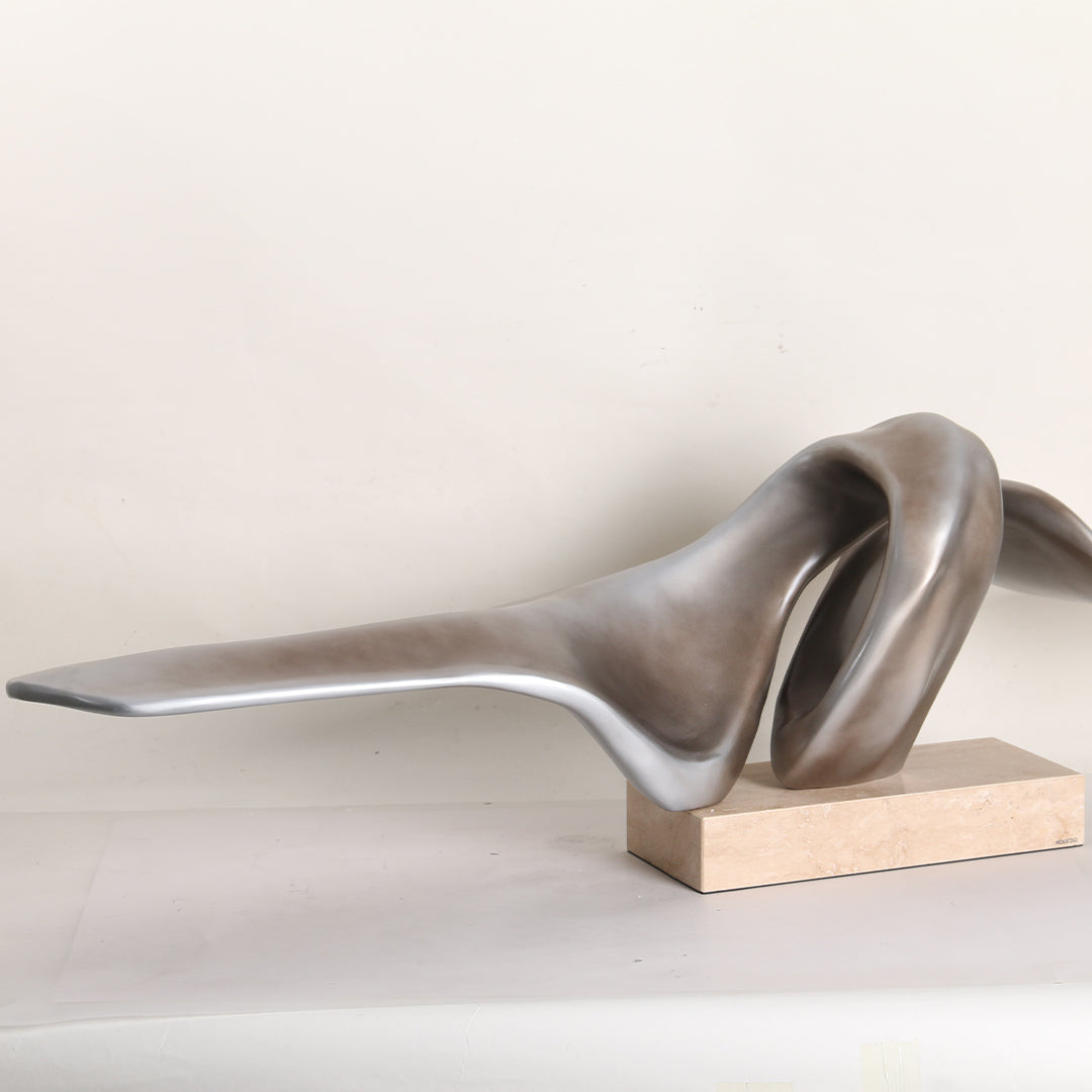 Abstract sculpture KA3114A by BEACON, modern home decor figurine with sleek, artistic design for contemporary interior decoration.