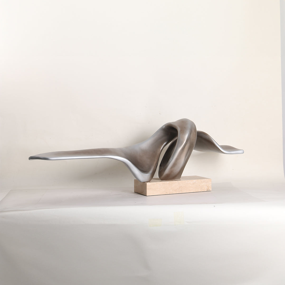 Abstract BEACON sculpture figurine for home decor, modern artistic design, with flowing curves and textured surface.